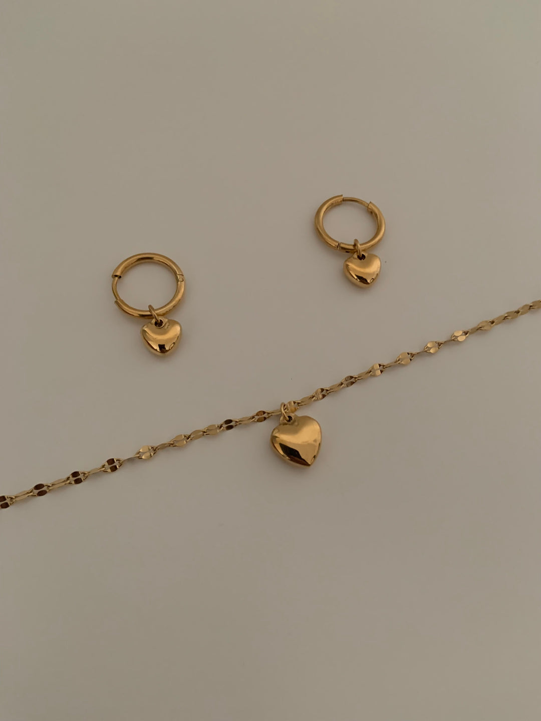 One Luv Tiny Gold Heart earring